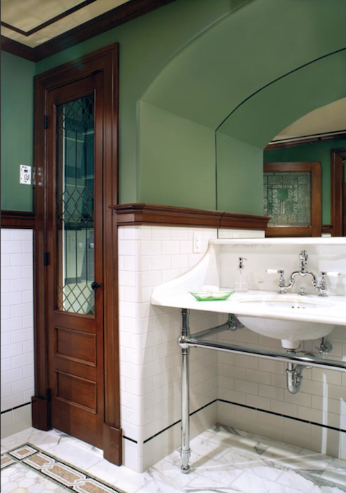 Planning our DIY bath remodel— inspiration and design ideas… repurpose an antique door into bathroom storage.