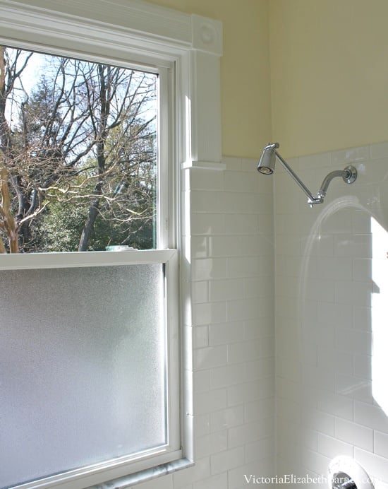 Our old-house bathroom has a large window IN the shower... See our DIY solution to cover it... and the entire before-and-after remodel!