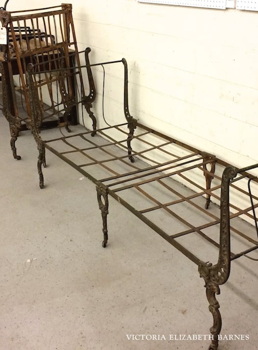 I’m decorating our old Victorian house via Craigslist and auctions… This folding iron campaign bed is my latest treasure! If you love salvaged decor, come see what else I’ve collected.