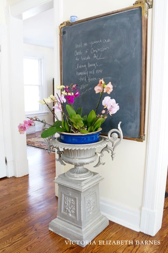 Antique garden urns add so much charm to your decor! Come tour our Victorian house… the BEST part is the decorating! I LOVE salvaged and repurposed antiques and there are so many uses for this old, cast iron, Victorian planter! 