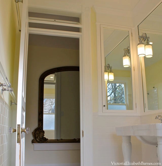 Old house bathroom remodel with vintage design. Subway tile, marble lookalike, custom cabinet, transom window....