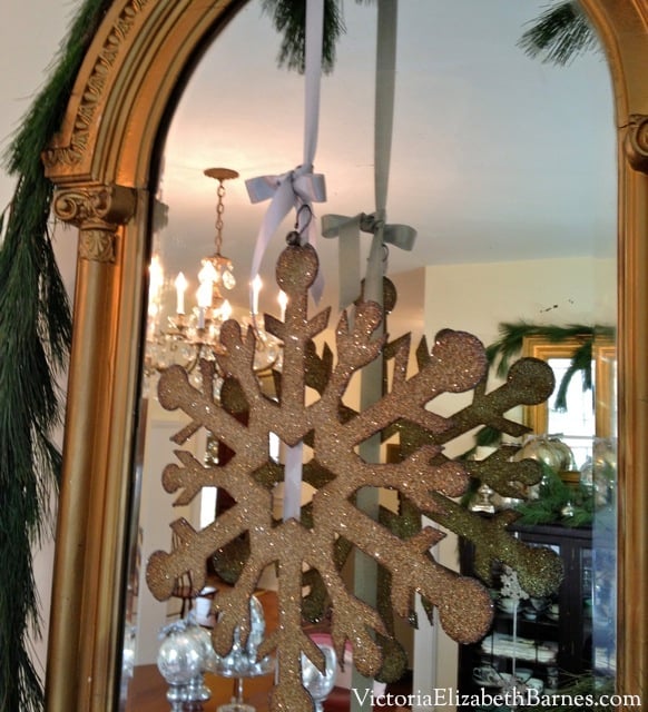Victorian home decorated for Christmas. How to make a bow. How to make your dining room look elegant. Decorating with evergreen garland and mercury glass Christmas ornaments. Fast, easy Christmas decorations using household items. German glass glitter