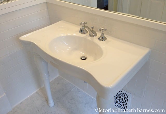 DIY bathroom remodel. Victorian house. Subway tile, vintage bathroom fixtures, porcelain console sink.