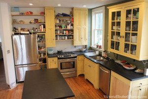Pilar Guzman's kitchen... gorgeous, repurposed Victorian cabinets.