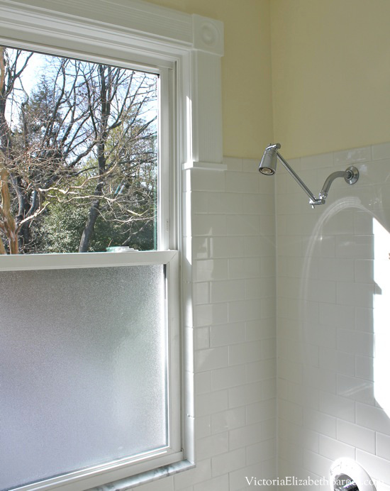 Our old-house bathroom has a large window IN the shower... See our DIY solution to cover it... and the entire before-and-after remodel!