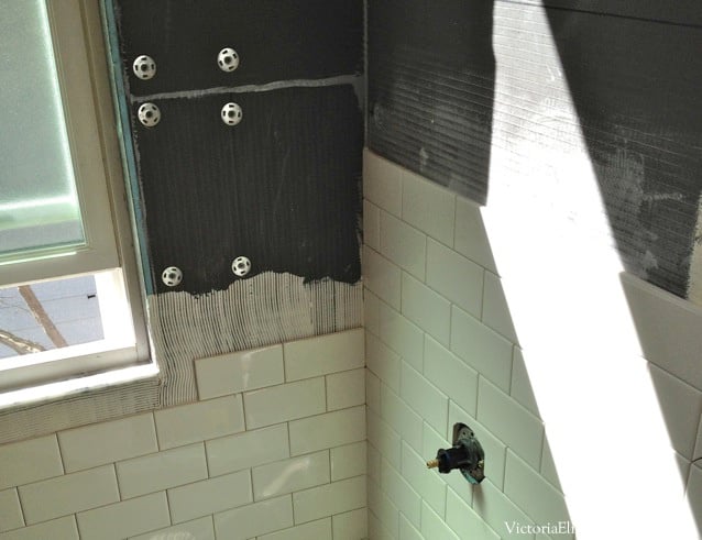 Our old-house bathroom has a large window IN the shower... See our DIY solution to cover it... and the entire before-and-after remodel!