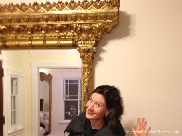My favorite antique mantel mirror. Large, gilded wall mirror with ornate plaster molding.