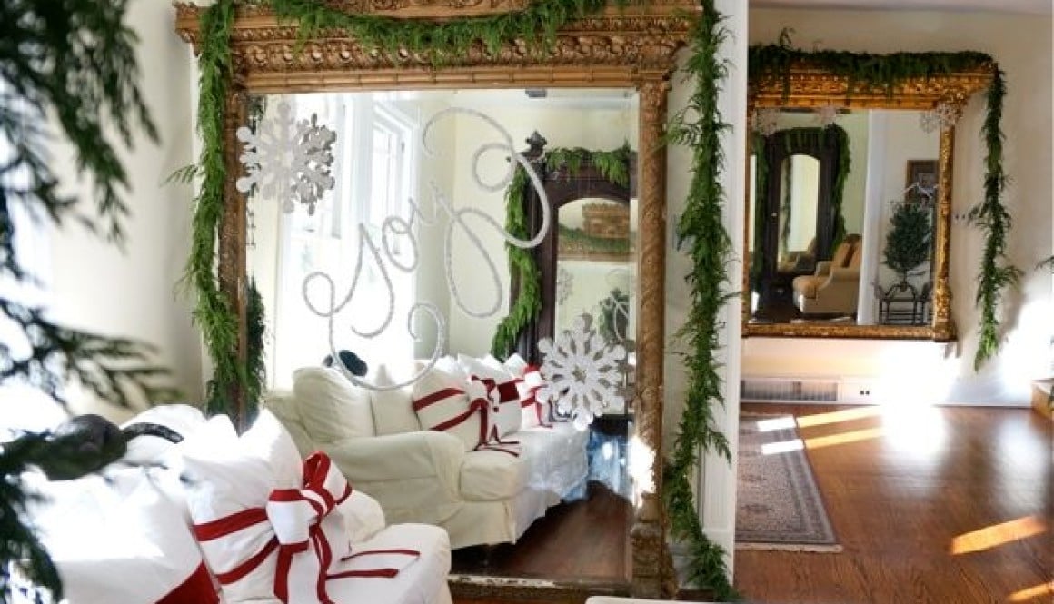 Decorating our Victorian home for Christmas… I used glitter to write on the giant gilded mirror I scored on Craigslist!!
