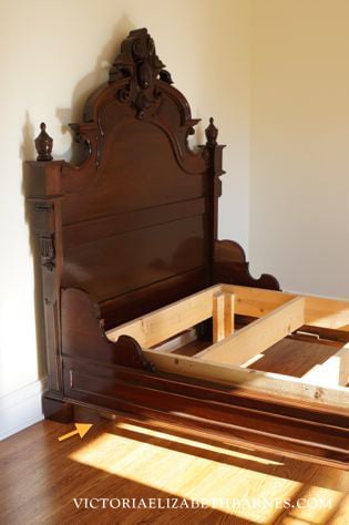 We got this fantastic, antique bed on craigslist, but it’s only a full-size… see how we retrofitted it to accommodate our queen-size mattress. 