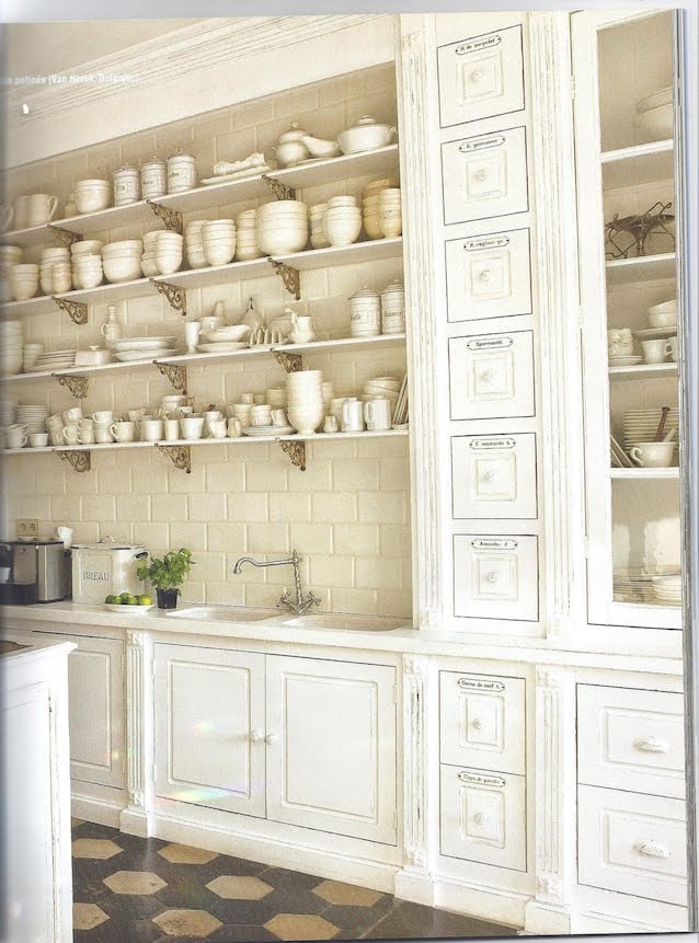Inspiration for our old-house, DIY kitchen remodel… I love the idea of using salvaged or repurposed materials in place of a traditional kitchen cabinets.