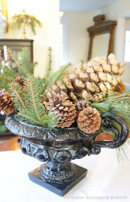 Decorating our Victorian home for Christmas… I used lots of evergreens and HUGE pinecones for simple and lush holiday decor.