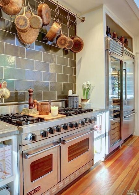 We are restoring an old Victorian house, currently DIY-ing the kitchen remodel… so far my design is unconventional: a repurposed piano island, pool table slate into countertops… and I’m thinking of skipping the range hood.